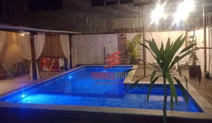 Casa com 4 dormitórios à venda, 217 m² por R$ 1.070.000,00 - Macuco - Santos/SP