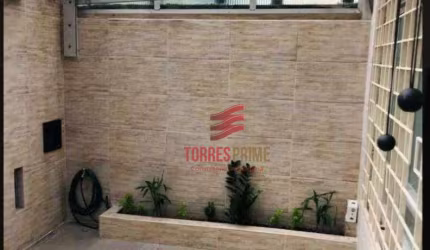 Sobrado com 3 dormitórios à venda, 100 m² por R$ 860.000,00 - Encruzilhada - Santos/SP