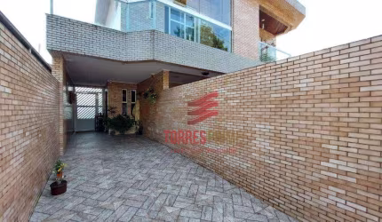 Casa com 3 dormitórios à venda, 116 m² por R$ 682.000,00 - Vila Valença - São Vicente/SP