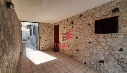 Sobrado com 5 dormitórios à venda, 300 m² por R$ 1.600.000,00 - Gonzaga - Santos/SP