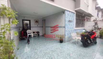Sobrado com 3 dormitórios à venda, 103 m² por R$ 900.000,00 - Encruzilhada - Santos/SP