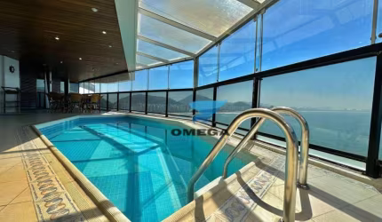 FRENTE MAR - Apartamento de luxo à venda na praia das Astúrias, com 4 Suítes, lazer de clube e 3 vagas.
