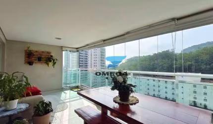 Apartamento com varanda gourmet - 4 dormitórios - 2 vagas de garagem à venda na praia das Astúrias - Guarujá/SP