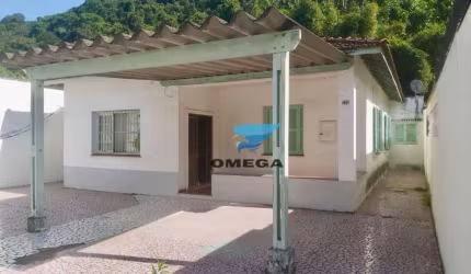 Casa à venda nas Pitangueiras no Guarujá | Omega Imóveis