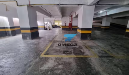Vaga de garagem á venda na praia das Pitangueiras no Guarujá I Omega Imoveis