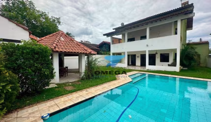 Casa à venda em Condomínio Jardim Acapulco no Guarujá | Omega Imóveis