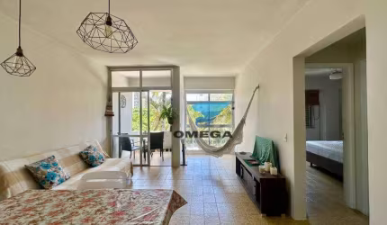 Apartamento à venda na praia do Tombo no Guarujá I Omega Imoveis