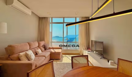 Apartamento frente mar à venda na praia das Pitangueiras no Guarujá I Omega Imoveis
