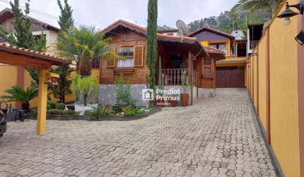 Casa linear com 2 dormitórios à venda, 116 m² por R$ 640.000 - Jardim Califórnia - Nova Friburgo/RJ