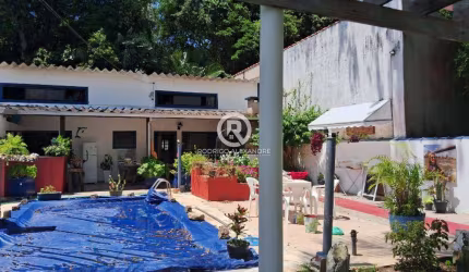Charmosa Casa Geminada com Suíte, Piscina e Espaço Gourmet em Peruíbe - Oportunidade Imperdível!