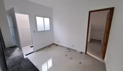 Locação Casa 2 quartos 1 suíte - Térrea com quintal - em condomínio na Vila Caiçara em Praia Grande - SP - LO06- CS3