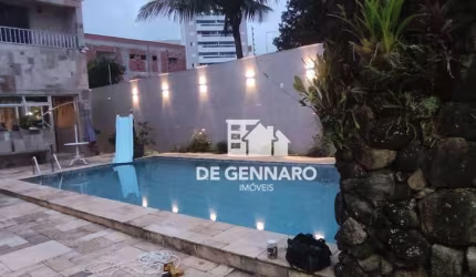 Casa com 3 dormitórios à venda, 254 m² por R$ 1.300.000,00 - Caiçara - Praia Grande/SP