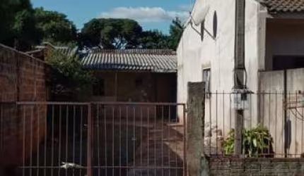 TERRENO COM 2 CASAS , OTIMO INVESTIMENTO .