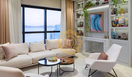 Apartamento com vista mar em Itapema - SC com 185m² privativos, contendo 04 suítes, amplo living, lavabo, espaço gourmet, sacada com churrasqueira