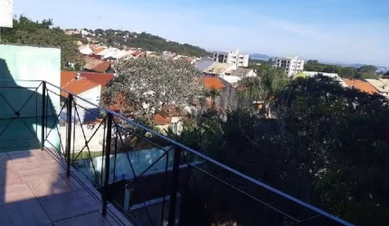 Casa com 3 quartos à venda na Rua Imeram Teixeira Cabeleira, 144, Ipanema, Porto Alegre por R$ 580.000