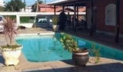 Casa no bairro Cibratel 1, em Itanhaém - sendo lado praia, em rua calçada.