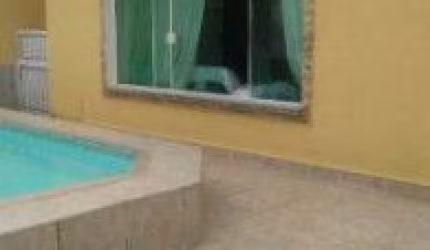 Casa no bairro Jardim Imperador, em Praia Grande - sendo lado praia, com acesso pavimentado.