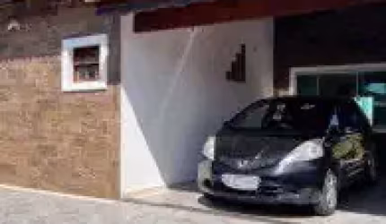Casa no bairro Jardim Califórnia, em Itanhaém - sendo lado praia, em rua calçada.