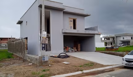 Ótima casa em condomínio no bairro Jardim Guacira, em Itanhaém ** Aceita financiamento bancário!