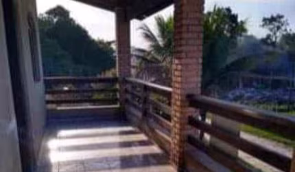 Sobrado com salão comercial no bairro Jardim Guacyra em Itanhaém-SP