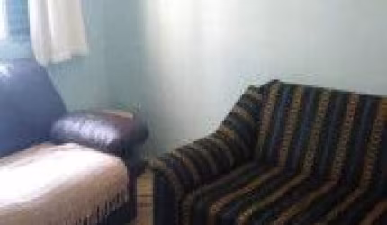 Apartamento localizado no bairro Canto do Forte, em Praia Grande - lado praia, em rua calçada.