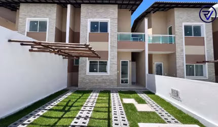 Casa em condomínio fechado com 4 quartos à venda na Rua Santa Cecília, 2700, Guaribas, Eusébio, 103 m2 por R$ 563.100
