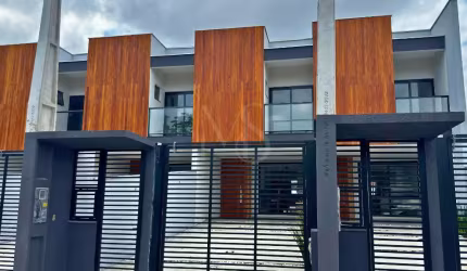 Sobrado Geminado no Iririú com 1 suíte + 2 dormitórios