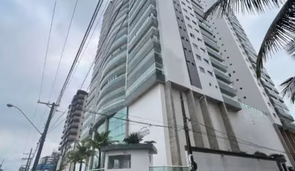 Apartamento com 3 suítes em frente a praia do caiçara com sacada gourmet vista mar definitiva.