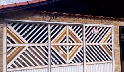 Casa à venda em Praia Grande-SP, Bairro Real: 2 quartos, 1 suíte, 1 sala, 2 banheiros, 2 vagas de garagem, 90,57 m² de área.