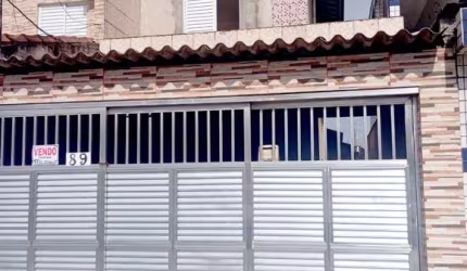 Sobrado Geminado 2 dormitórios, e Edícula com cozinha, dormitório e Wc, no Jardim Anhanguera em Praia Grande.