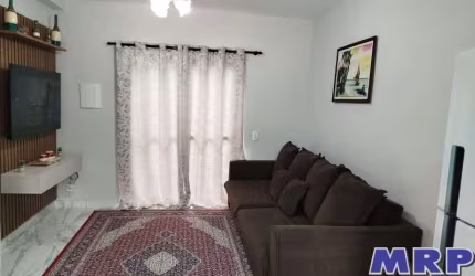 Apartamento duplex á venda em Ubatuba. 2 dormitórios. 2 vagas. Com piscina.