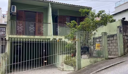 Sobrado com 4 dormitórios à venda, 143 m² por R$ 750.000,00 - Agronômica - Florianópolis/SC