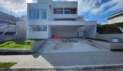 Casa com 3 dormitórios à venda, 370 m² por R$ 3.080.000,00 - Condomínio Residencial Jaguary - São José dos Campos/SP