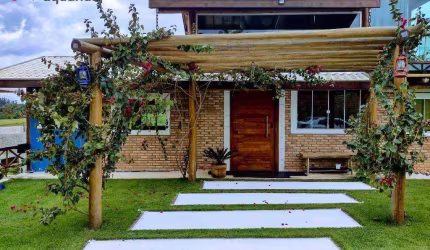 Casa com 4 dormitórios, 338 m² - venda por R$ 1.300.000,00 ou aluguel por R$ 7.610,00/mês - Condomínio Quinta dos Lagos - Paraibuna/SP