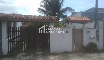 Terreno de 363 mts²  com 2 casas e uma Kitinet  á 500 mtrs da praia -Venda