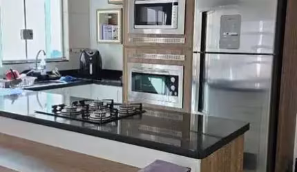 Casa com 2 dormitórios à venda, 175 m² por R$ 583.000,00 - Jardim das Flores - Suzano/SP