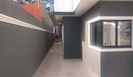 Casa com 3 dormitórios à venda, 83 m² por R$ 440.000,00 - Chácara Holiday - Itaquaquecetuba/SP
