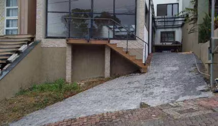 Casa com 3 dormitórios à venda, 232 m² por R$ 729.000,00 - Cavalhada - Porto Alegre/RS