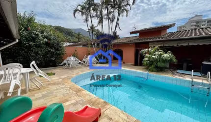 Sobrado à venda na Martim de Sá - 4 dormitórios, sendo 2 suítes, sala com 2 ambientes, lavabo, vaga