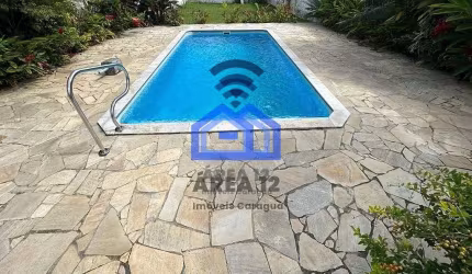 Casa com piscina à venda na Martim de Sá, 3 dormitórios, sendo 1 suíte, sala com dois ambientes, co