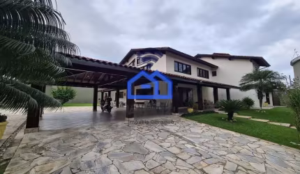 Sobrado de alto padrão à venda no bairro Martim de Sá com 4 suítes, 2 salas, piscina, área gourmet