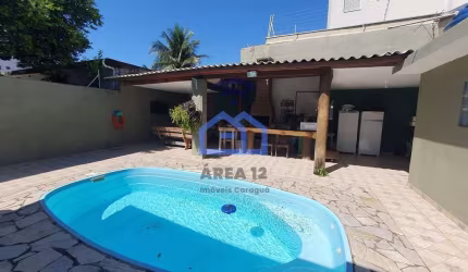 Casa à venda no bairro Martin de Sá - 4 dormitórios, sendo 2 suítes, sala, 4 banheiros, Área de laz