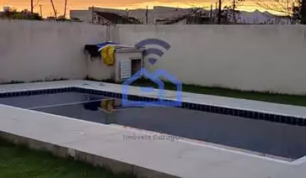Casa à venda no bairro Pontal de Santa Marina em Caraguatatuba, SP - 03 dormitórios, 01 suíte, 03 v