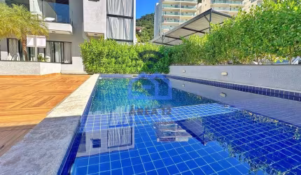 Sobrado à venda no bairro  Cidade Jardim em Caraguatatuba, SP - 02 Suítes, sala e cozinha integrado