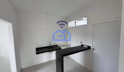 Apartamento para locação no bairro Tarumãs em Caraguatatuba, SP - 70m², com 2 dormitórios, sala, co