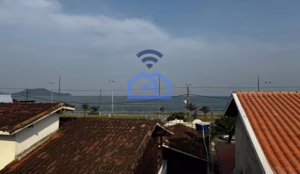 Triplex à venda no bairro do Massaguaçu em Caraguatatuba, SP - 2 dormitórios e terraço com churrasq