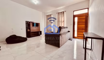 Casa à venda no bairro do Golfinho em Caraguatatuba, SP - 2 dormitórios, cozinha americana, garagem
