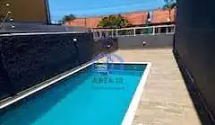 Sobrado à venda no bairro do Massaguaçu em Caraguatatuba, SP - com 3 dormitórios, sendo todos suíte