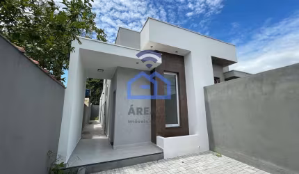 Casa nova à venda no bairro do Golfinho em Caraguatatuba, SP - Design moderno, conforto e excelente