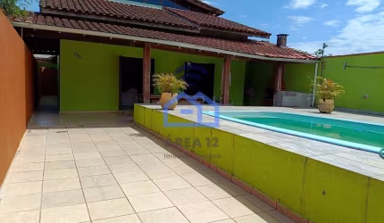 Casa à venda no bairro Pontal de Santa Marina em Caraguatatuba, SP - com 04 suítes, piscina, churra